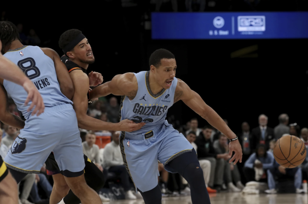 篮网完胜灰熊，布克带队取胜